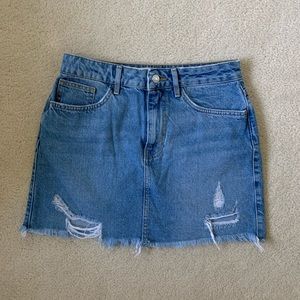 Distress high rise denim skirt